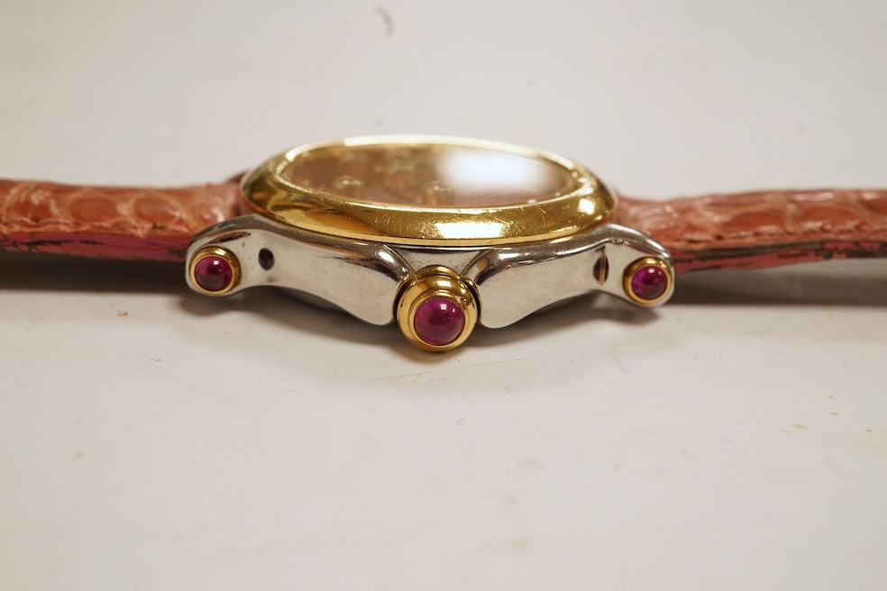 A lady's recent steel and gold Chopard 'Happy Sport' quartz wrist watch, the paua shell dial with seven 'floating' diamonds, on a leather strap wit gold plated Chopard clasp, with box, no papers. Condition - fair